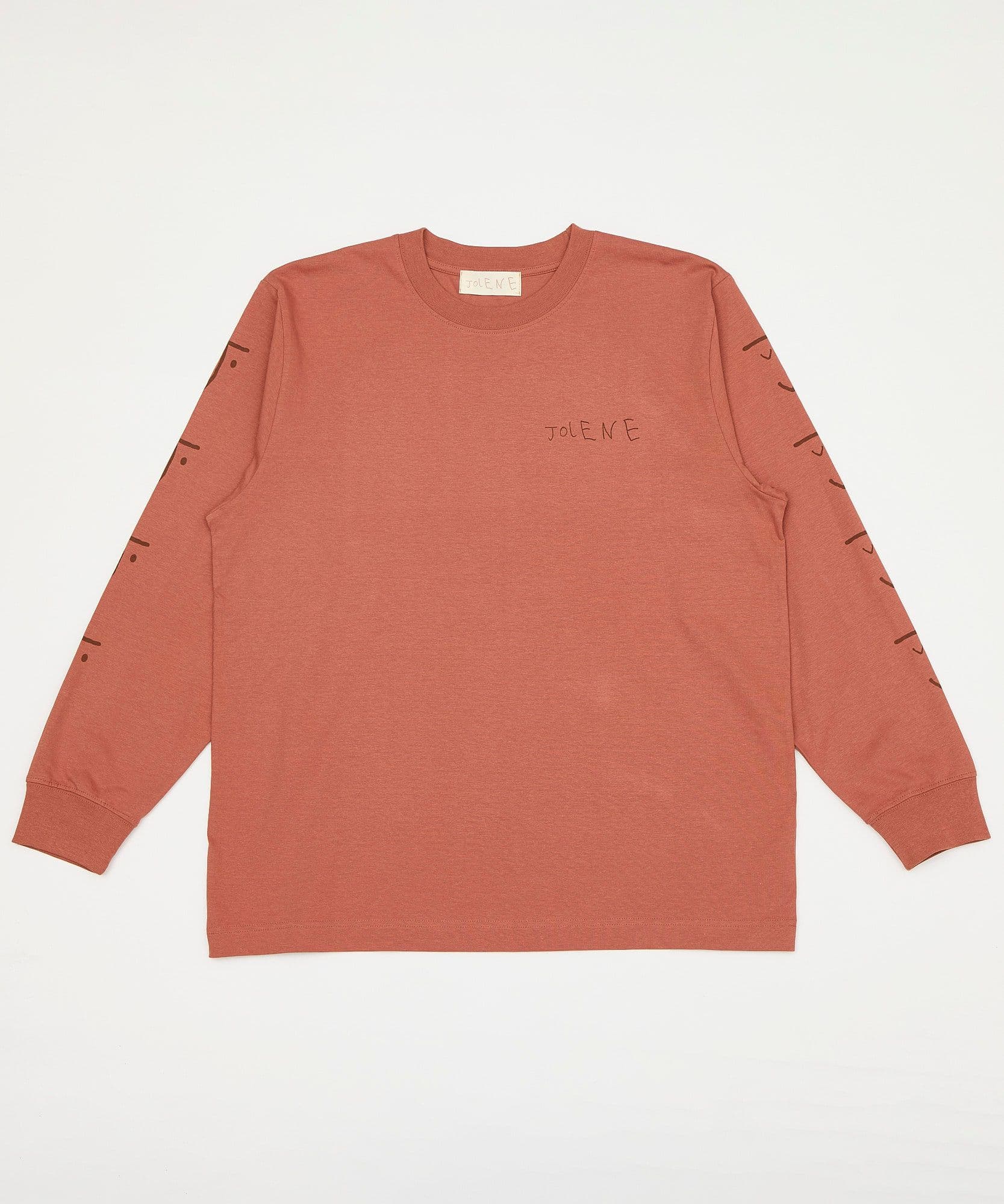 The Jolene bakery long sleeve t shirt showing the J face logo down the sleeve