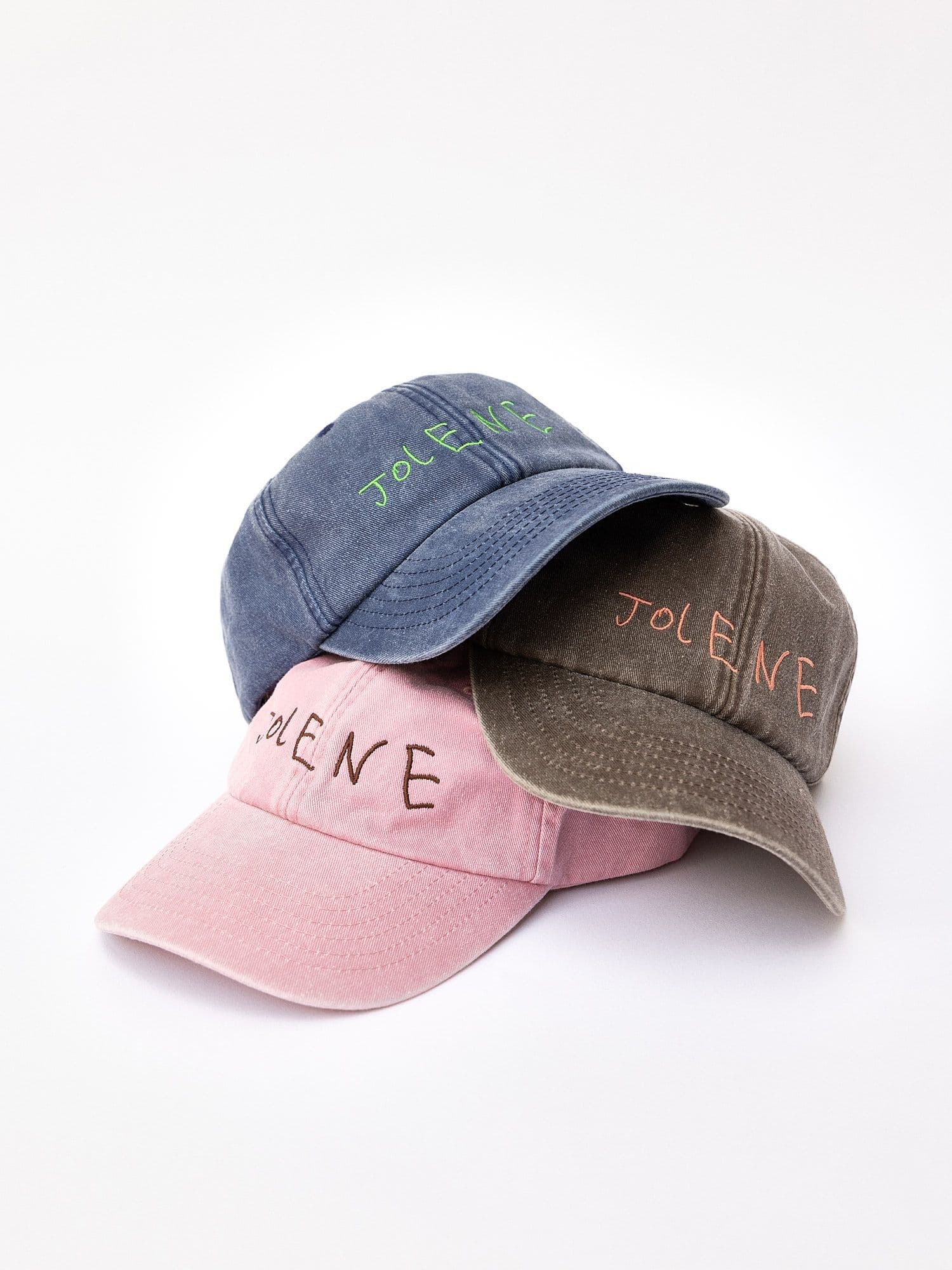 The Jolene house cap in pink with embroidered Jolene logo