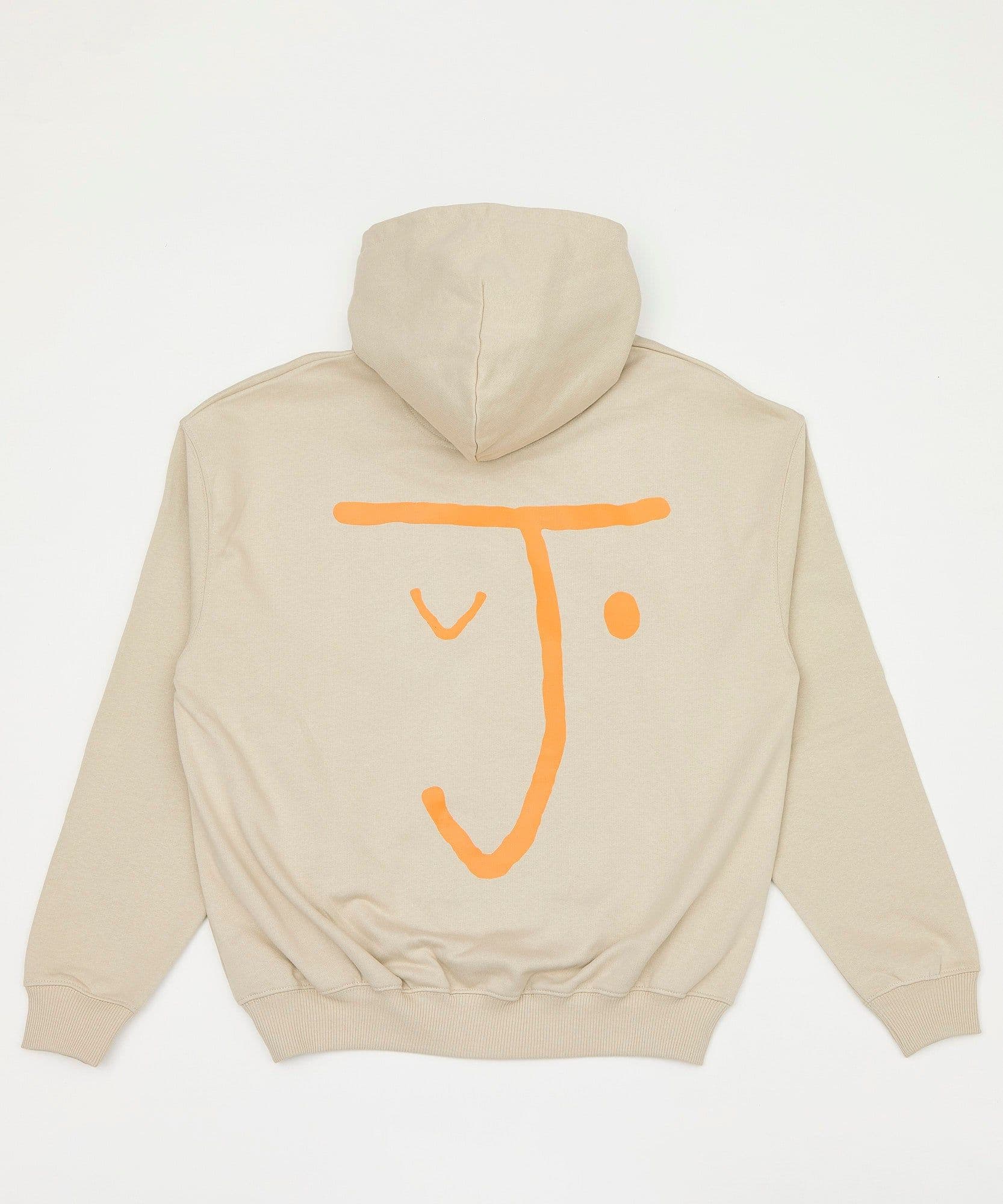 The jolene bakery J face hoodie in stone on a white background with a bright orange J face