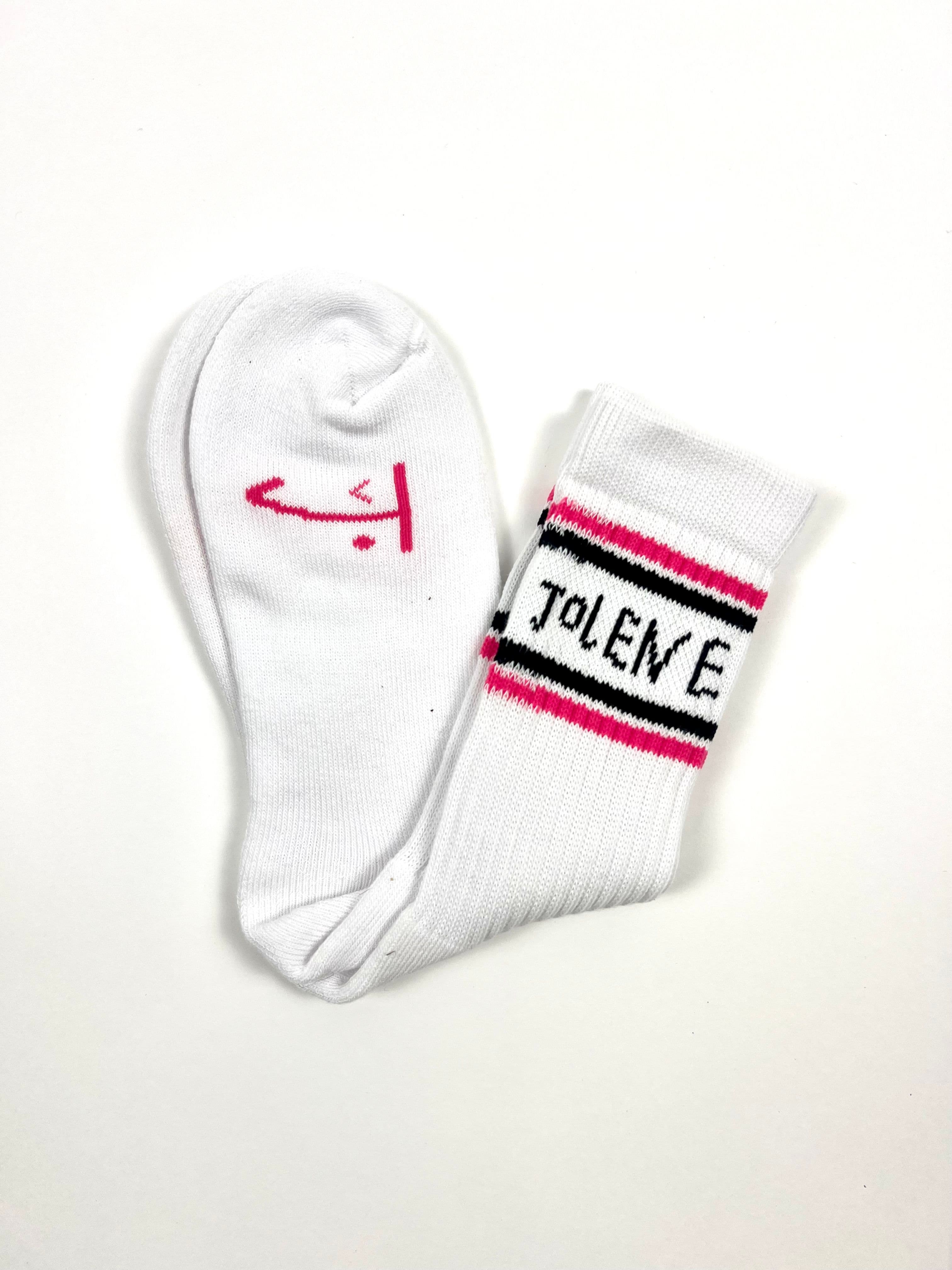 The Jolene bakery J socks with pink detail on a white background