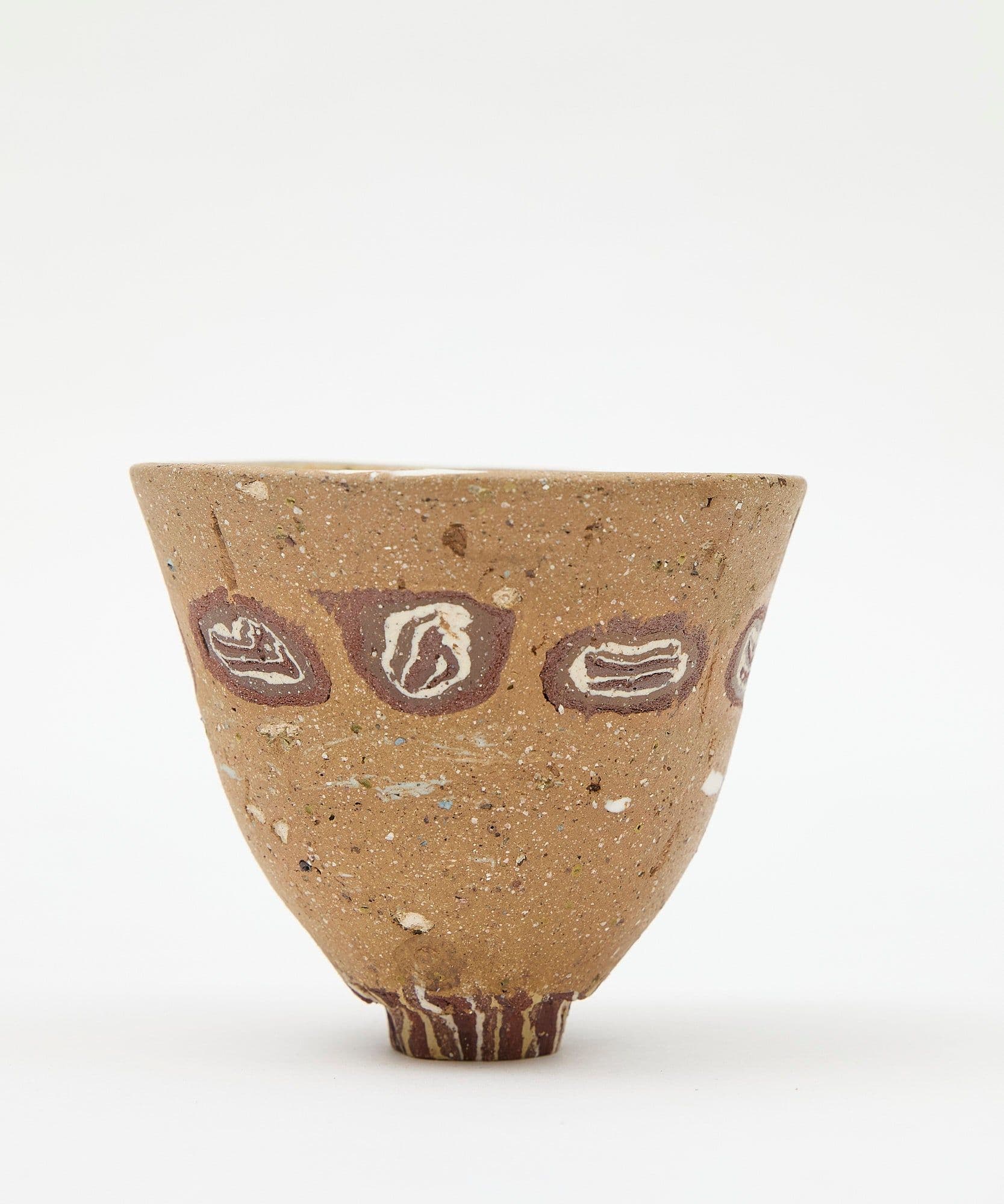 A clay cup pictured on a white background for sale Jolene bakery x Gráinne Williams