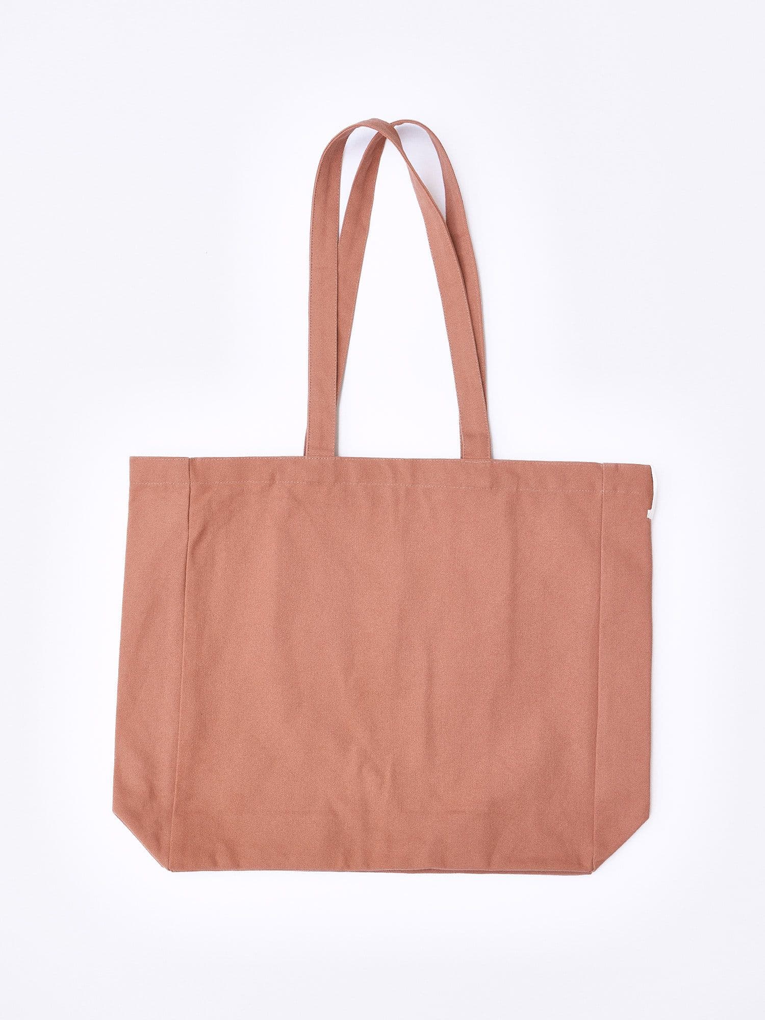 The Jolene Small Tote in pink pictured on a white background