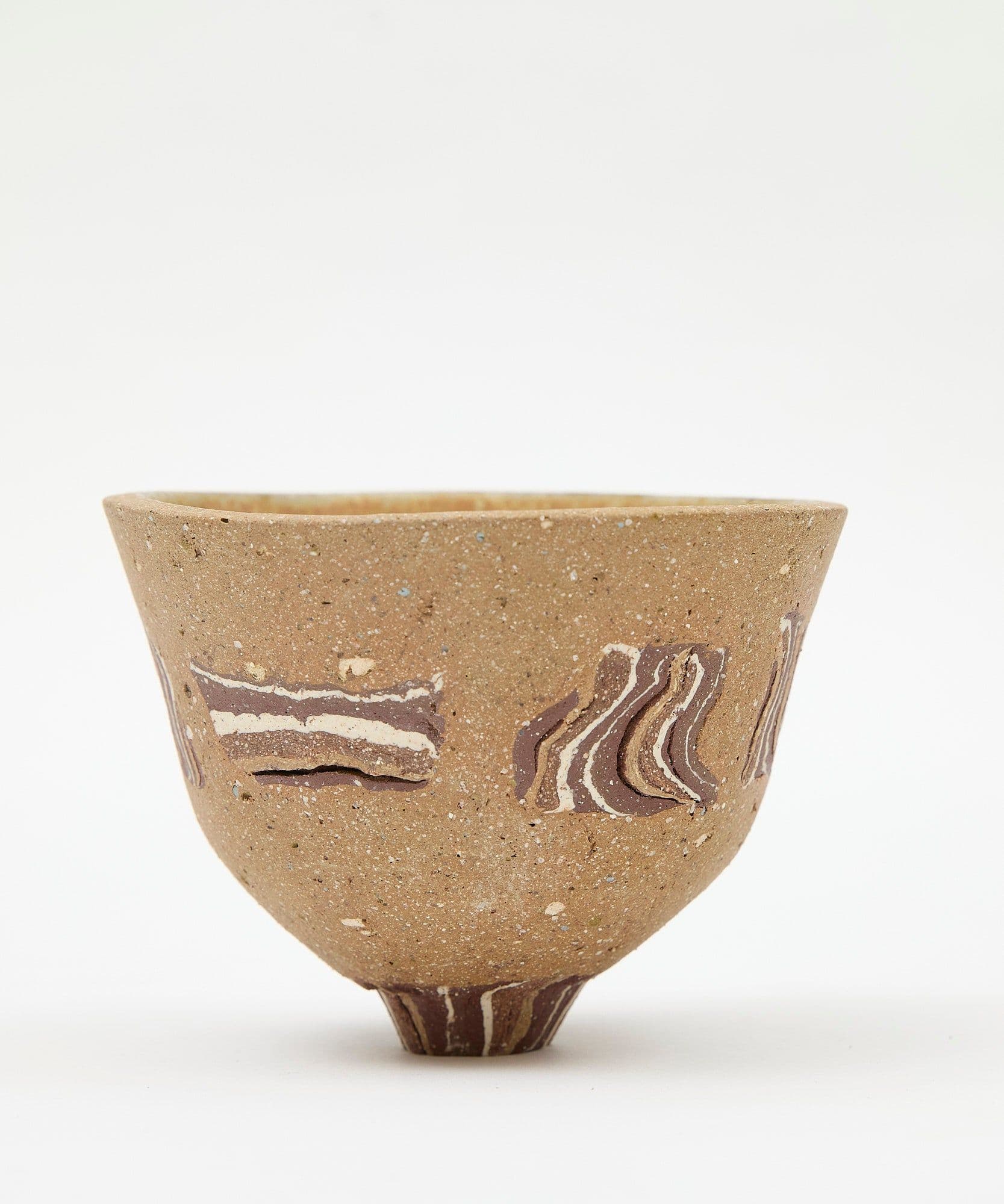 A clay cup pictured on a white background for sale Jolene bakery x Gráinne Williams