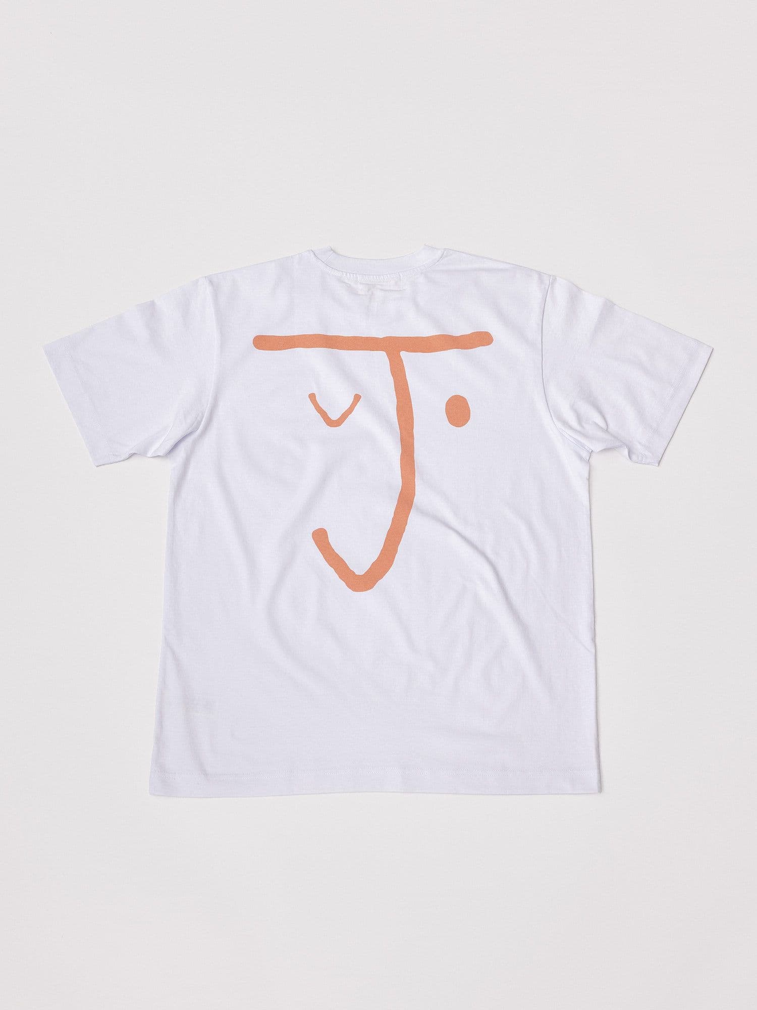 The Jolene bakery J Face short sleeve t shirt. The t shirt is white and has the J face logo in pink