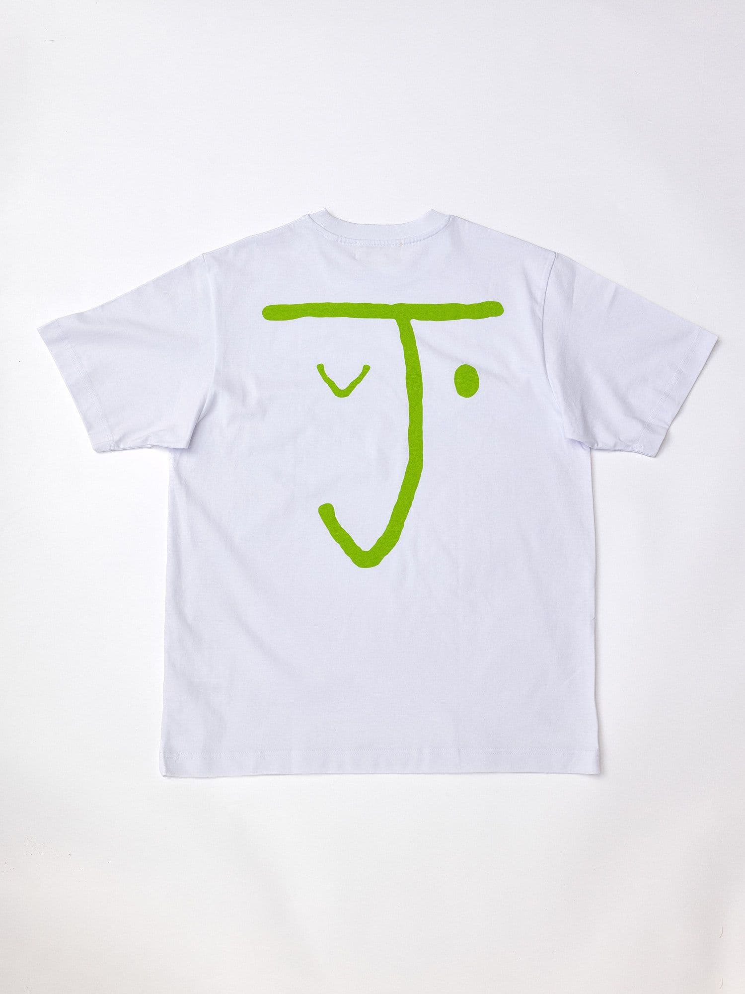 The Jolene bakery J Face short sleeve t shirt. The t shirt is white and has the J face logo in pea green