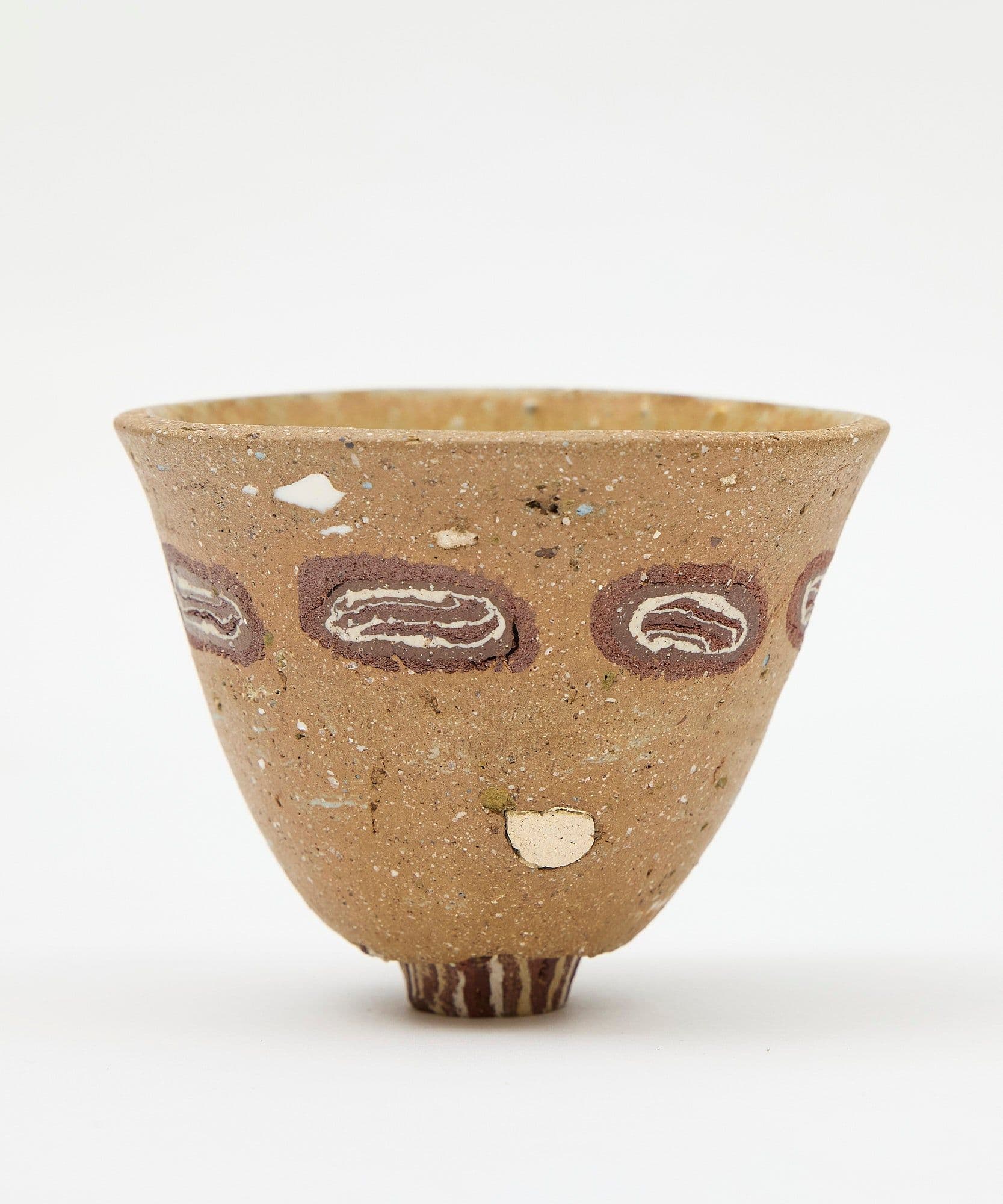 A clay cup pictured on a white background for sale Jolene bakery x Gráinne Williams