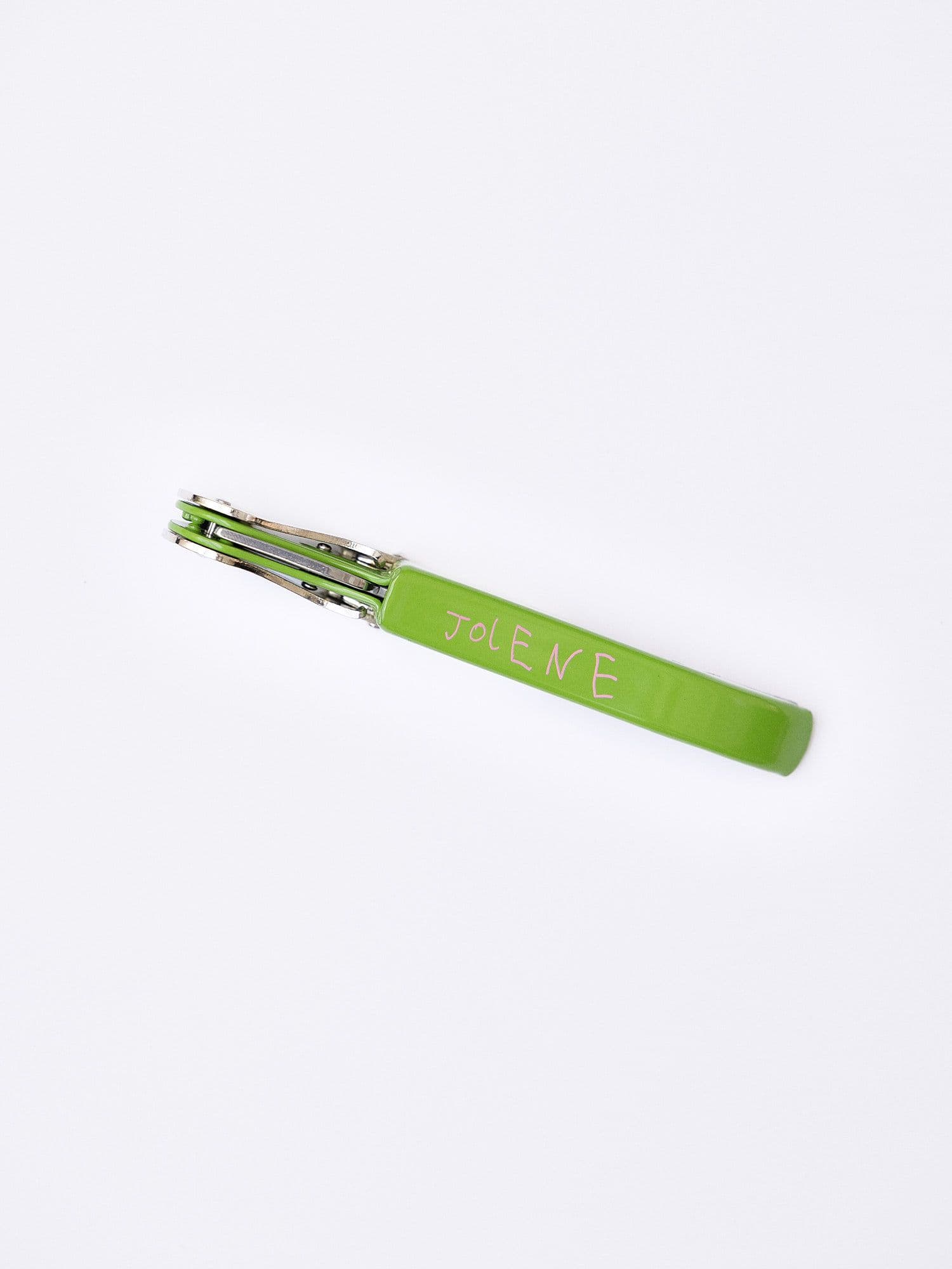 The Jolene bakery Pulltap's bottle opener in green with Jolene in pink
