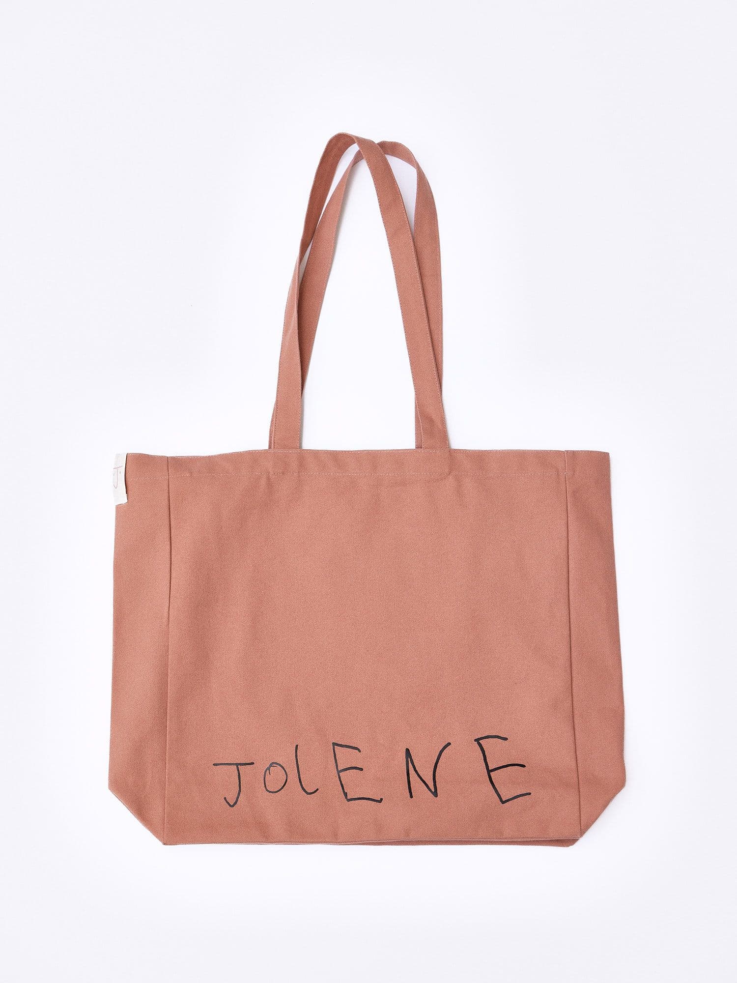 The Jolene Small Tote in pink pictured on a white background